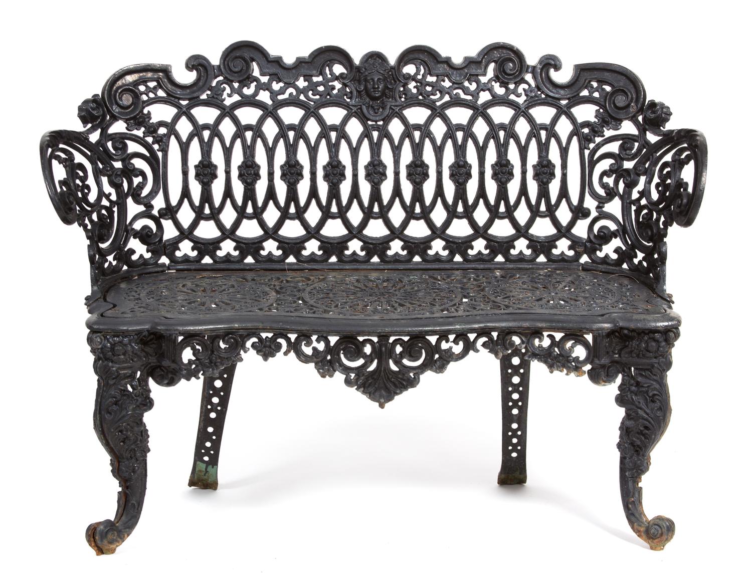 A Victorian Three-Piece Painted Iron Garden Suite Height of bench 33 x width 44 1/4 inches. — 19TH CENTURY