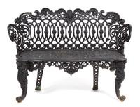 A Victorian Three-Piece Painted Iron Garden Suite Height of bench 33 x width 44 1/4 inches. — 19TH CENTURY