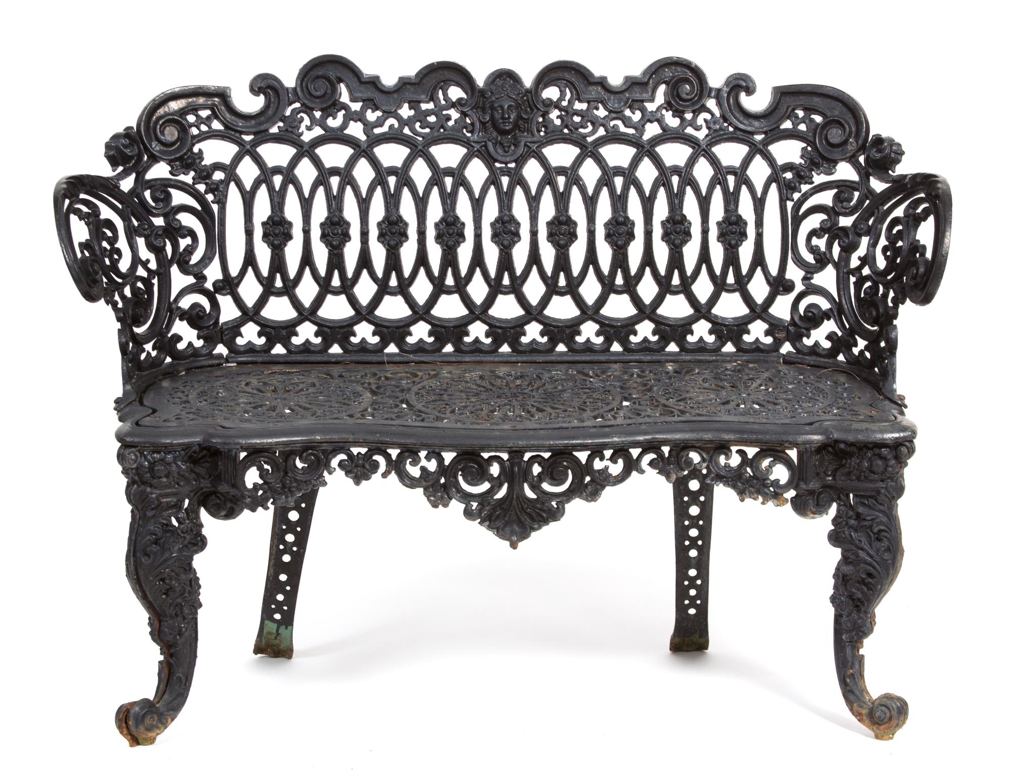 A Victorian Three-Piece Painted Iron Garden Suite Height of bench 33 x width 44 1/4 inches. — 19TH CENTURY