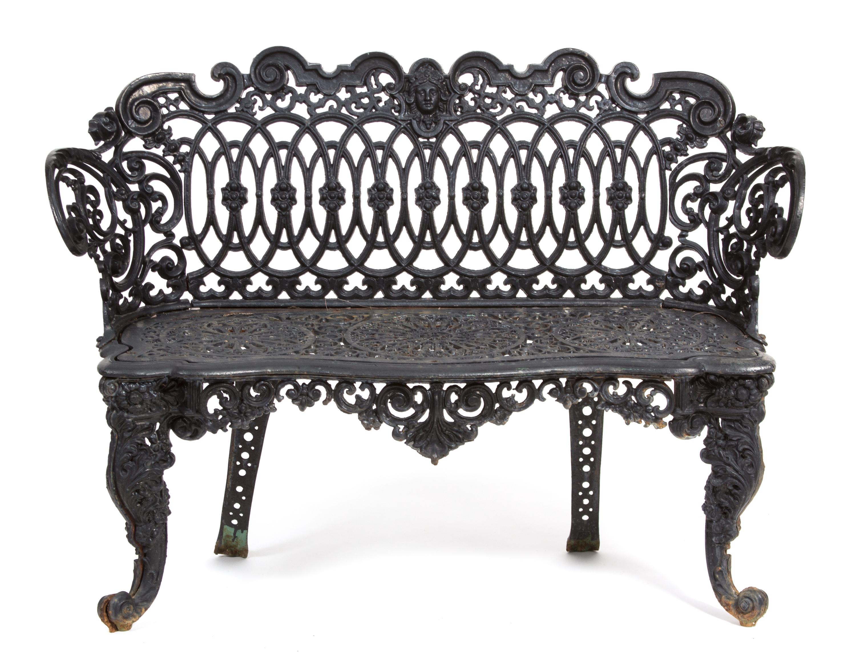 A Victorian Three-Piece Painted Iron Garden Suite Height of bench 33 x width 44 1/4 inches. — 19TH CENTURY