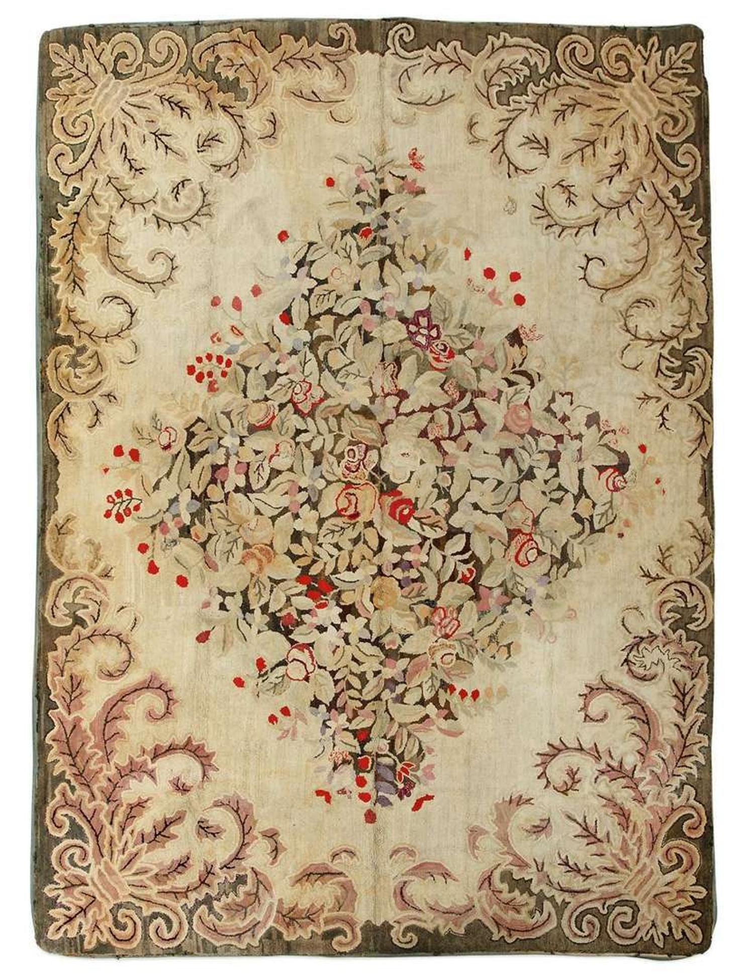 Large floral patterned room-sized wool hooked rug early 20th century