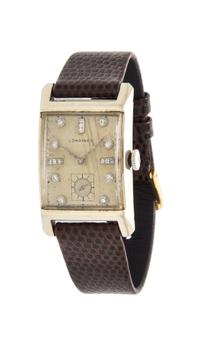 A 14 Karat Yellow Gold and Diamond Wristwatch, Longines, 27.20 dwts.