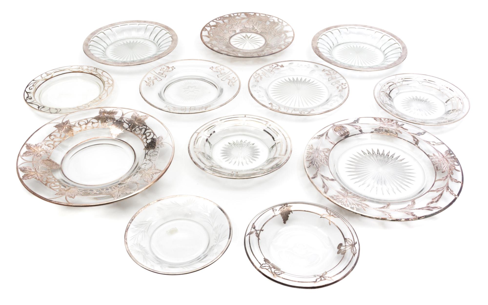 A Collection of Silver Overlay Glass Plates Diameter of largest 9 3/4 inches.