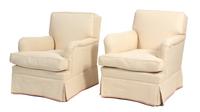 A White Upholstered Sofa and Two Matching Armchairs Length of sofa 68 inches. — 20TH CENTURY