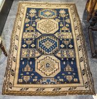 A Northwest Persian Wool Rug 4 feet 10 inches x 3 feet 3 inches. — 1ST HALF 20TH CENTURY