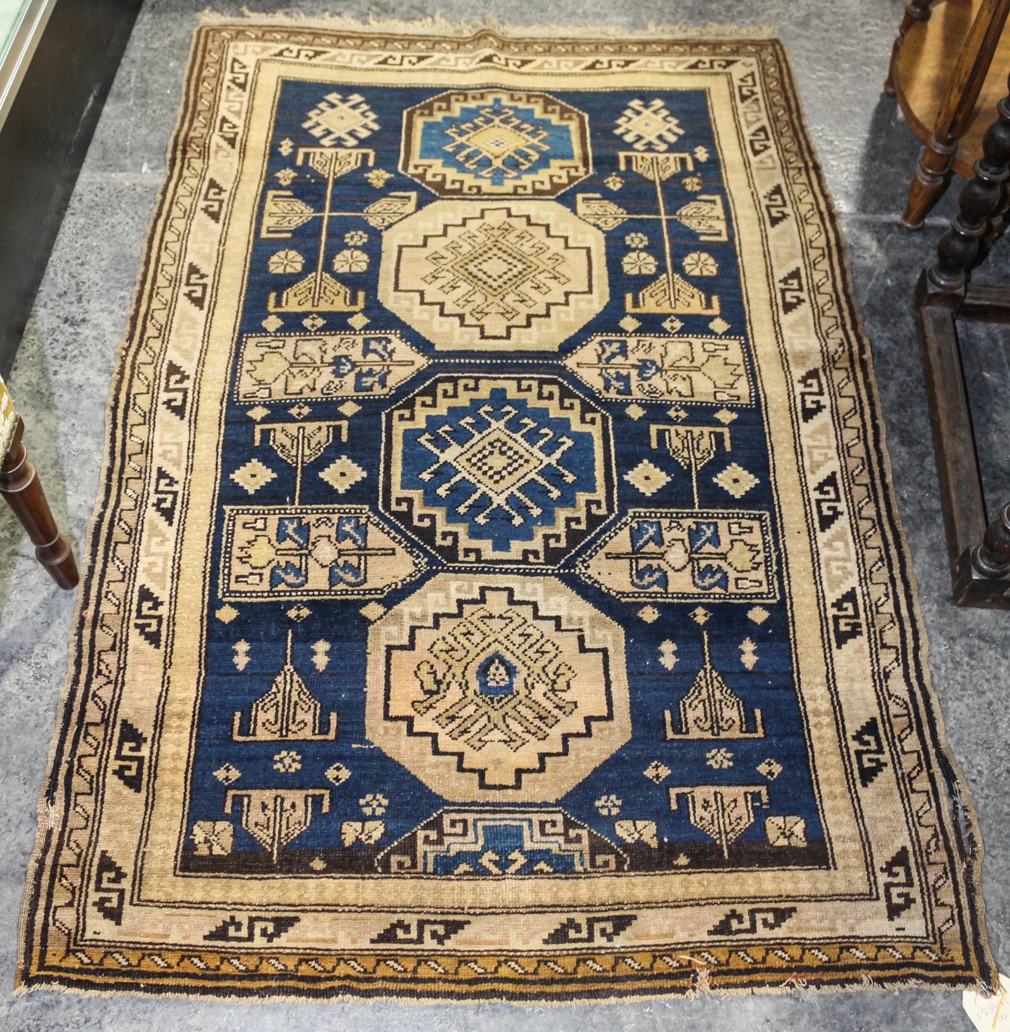 A Northwest Persian Wool Rug 4 feet 10 inches x 3 feet 3 inches. — 1ST HALF 20TH CENTURY