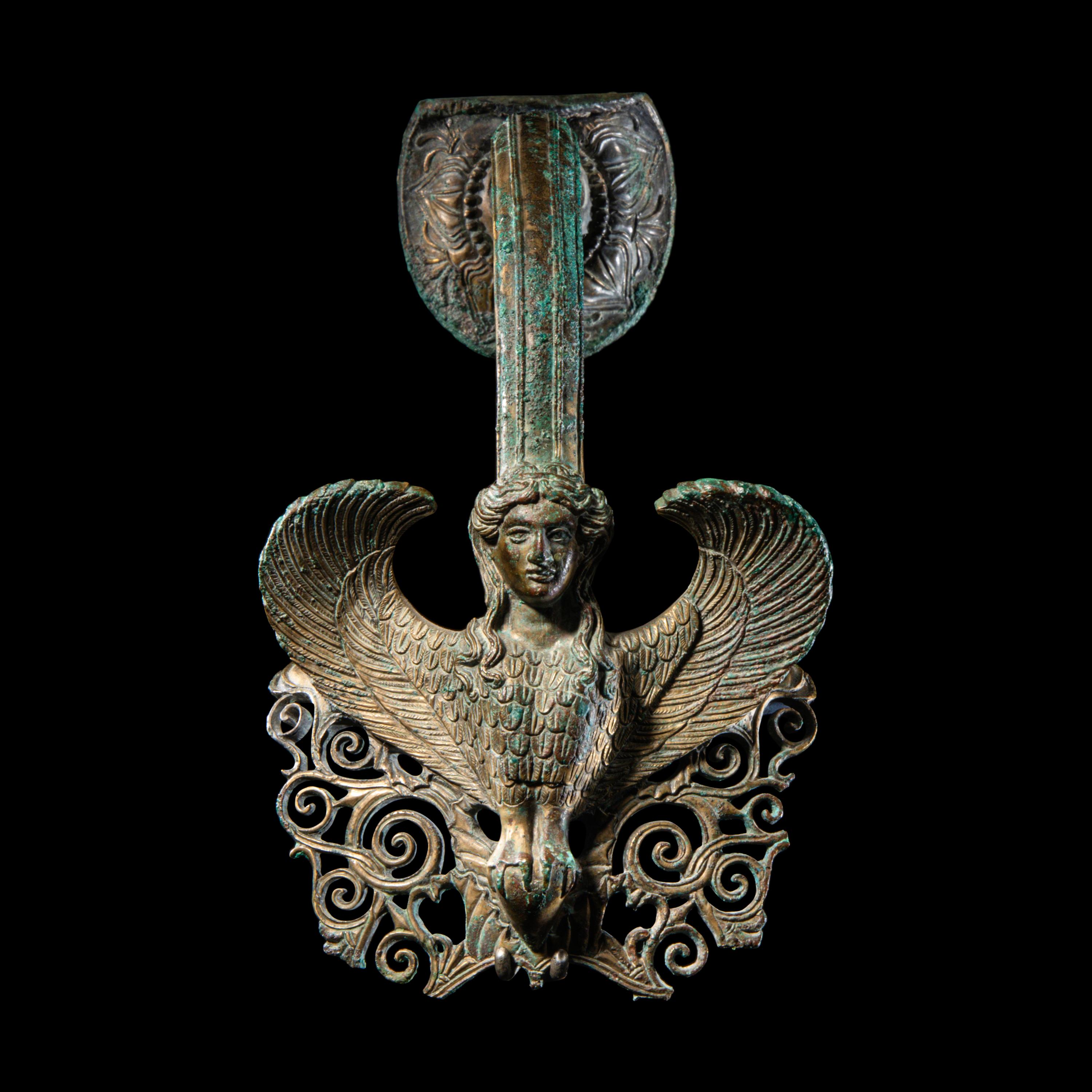 A Greek Bronze Hydria Handle with a Siren