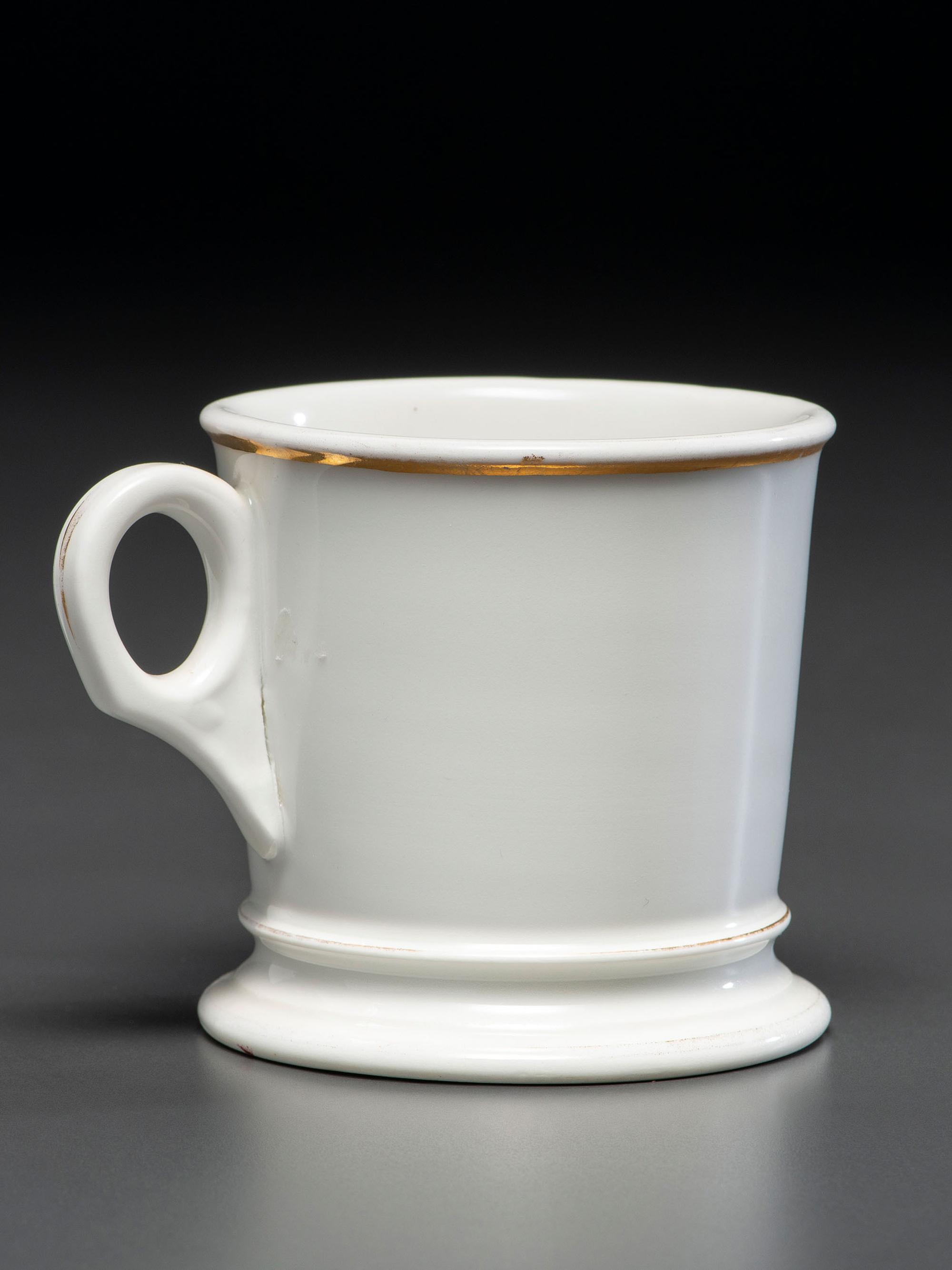 A Porcelain Shaving Mug Depicting a Woman Riding an Ice Velocipede