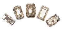 A Collection of Five American Silver Vesta Cases, Various Makers, comprising an example with a beaded meander and foliate decorated cas