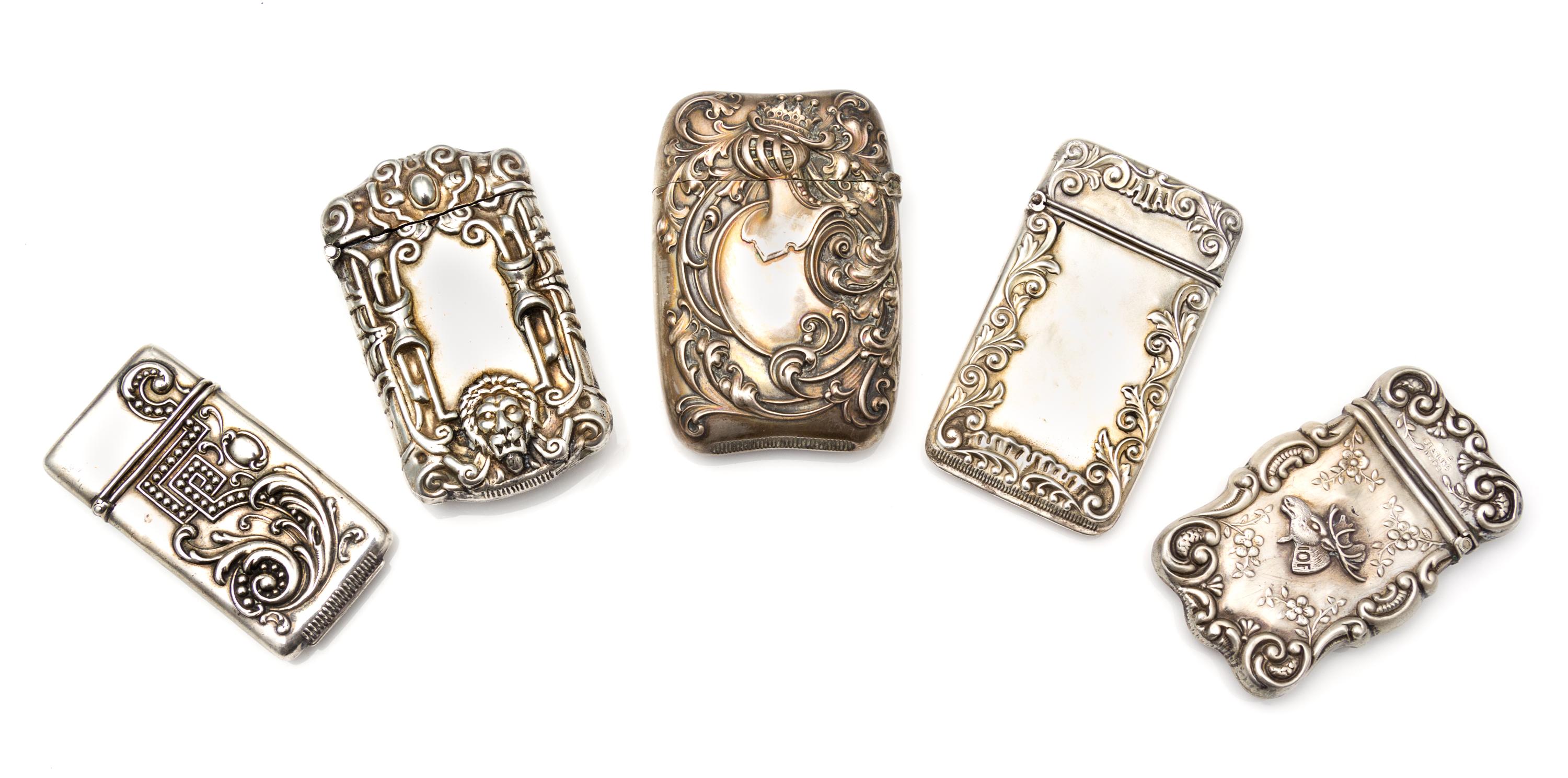 A Collection of Five American Silver Vesta Cases, Various Makers, comprising an example with a beaded meander and foliate decorated cas