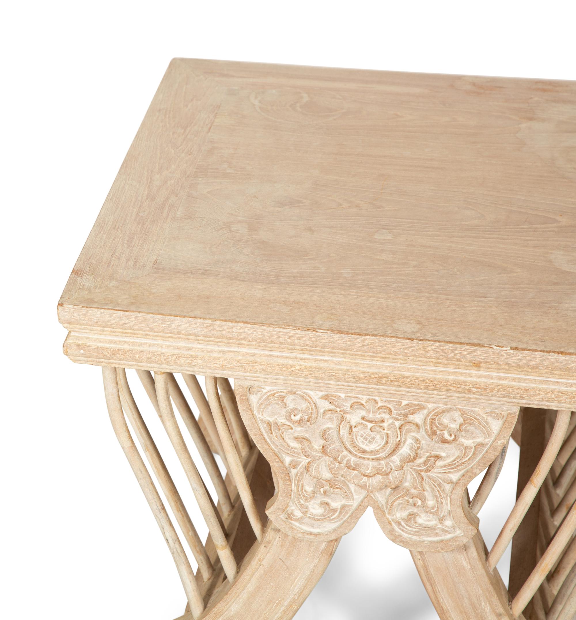 A Pair of Balinese Carved and Cerused Side Tables