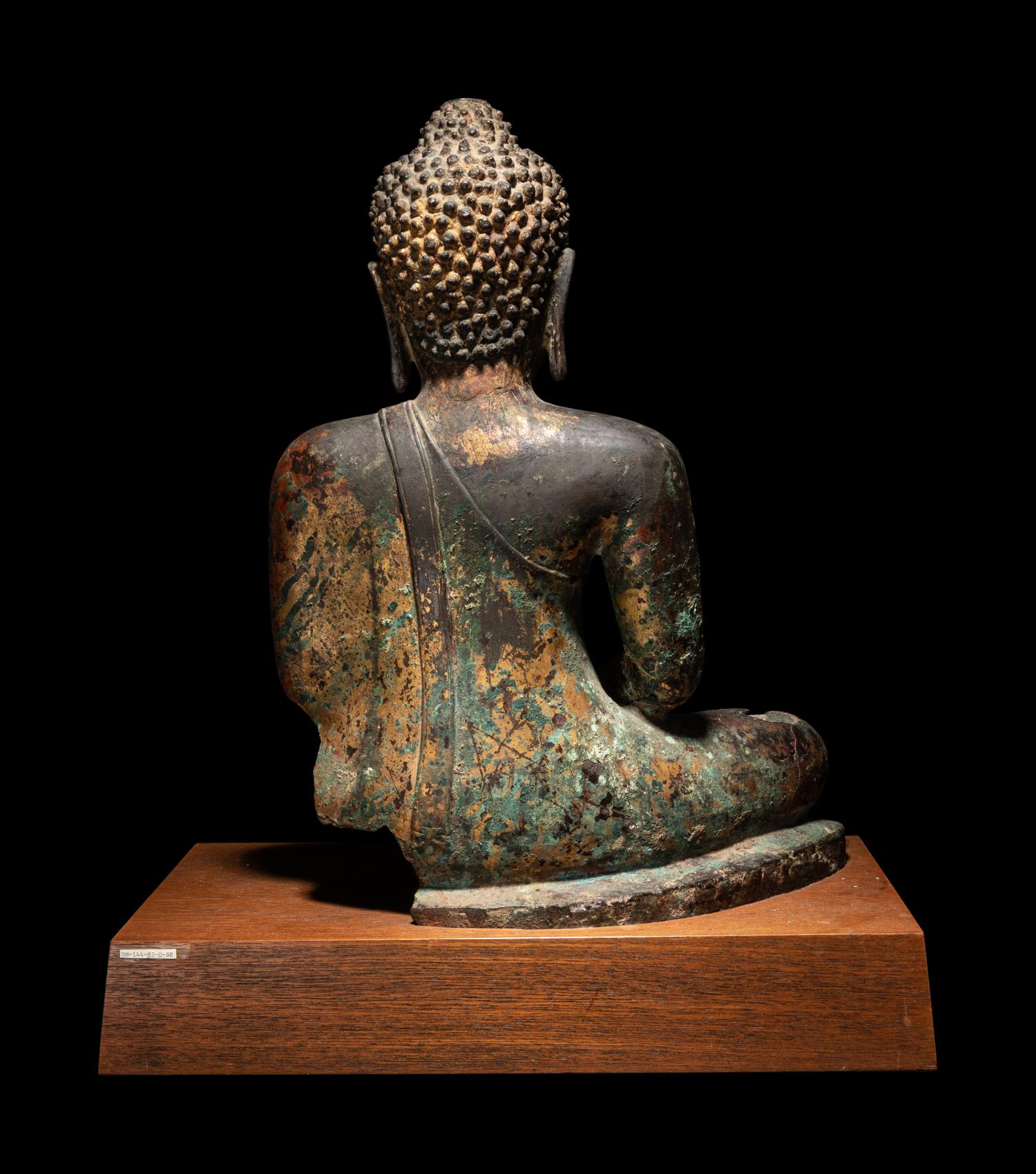 A Thai Gilt Decorated Bronze Figure of Seated Buddha