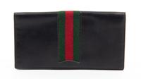 A Gucci Black Checkbook Cover, 6.25" x 3.25".