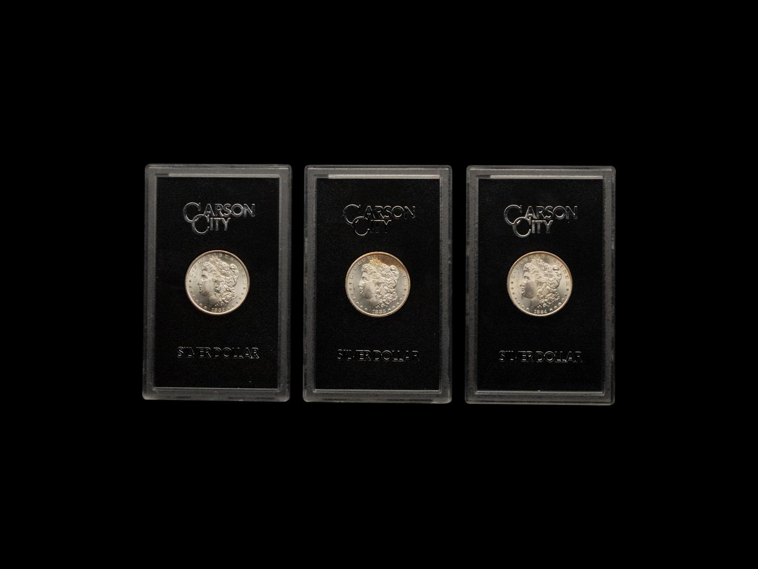 A Group of Three Carson City GSA: Morgan $1 Coins