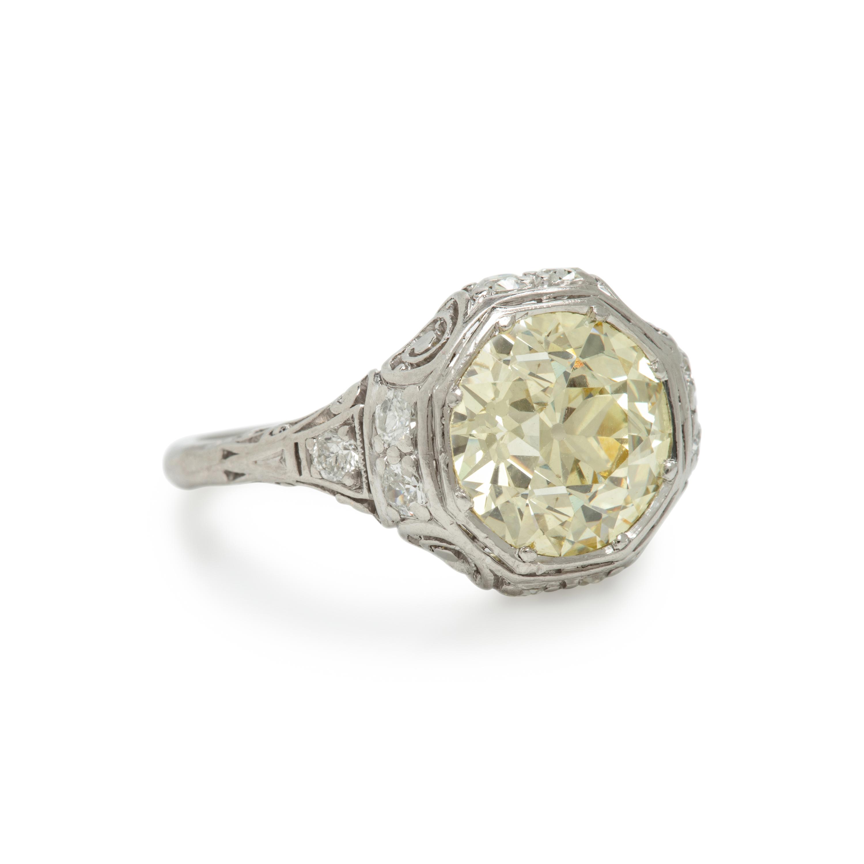 Yellow Diamond, Diamond, and Platinum Ring