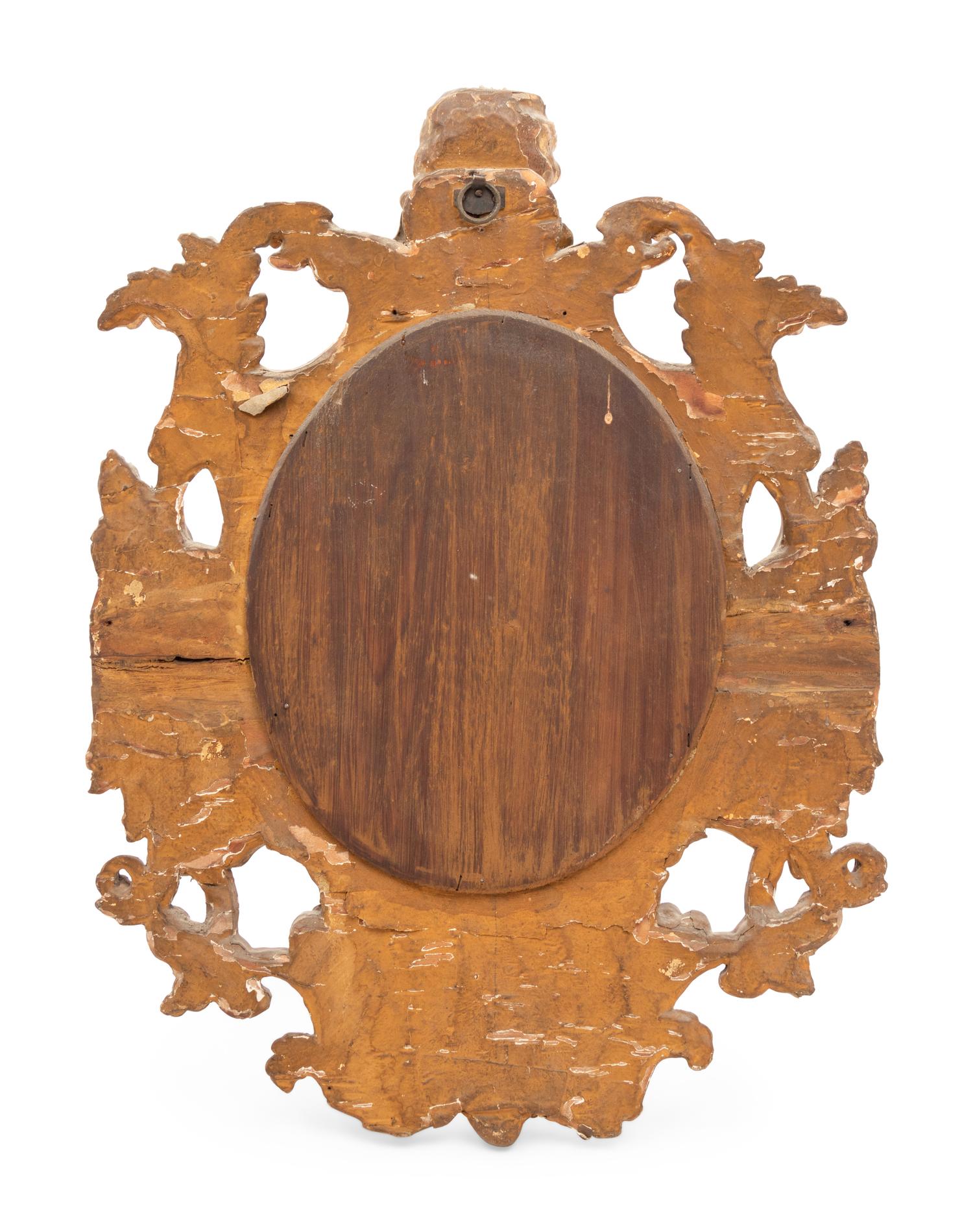 A Venetian Giltwood and Etched Glass Mirror