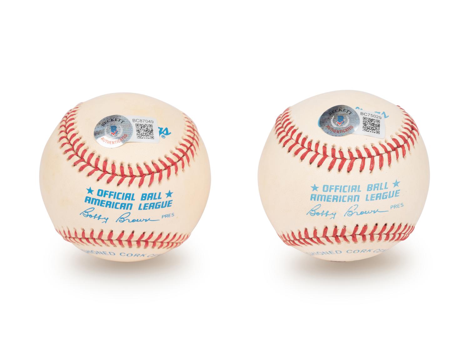 A Group of Yogi Berra and Whitey Ford Signed Autograph Baseballs (Beckett Authentication Services BAS Certified),