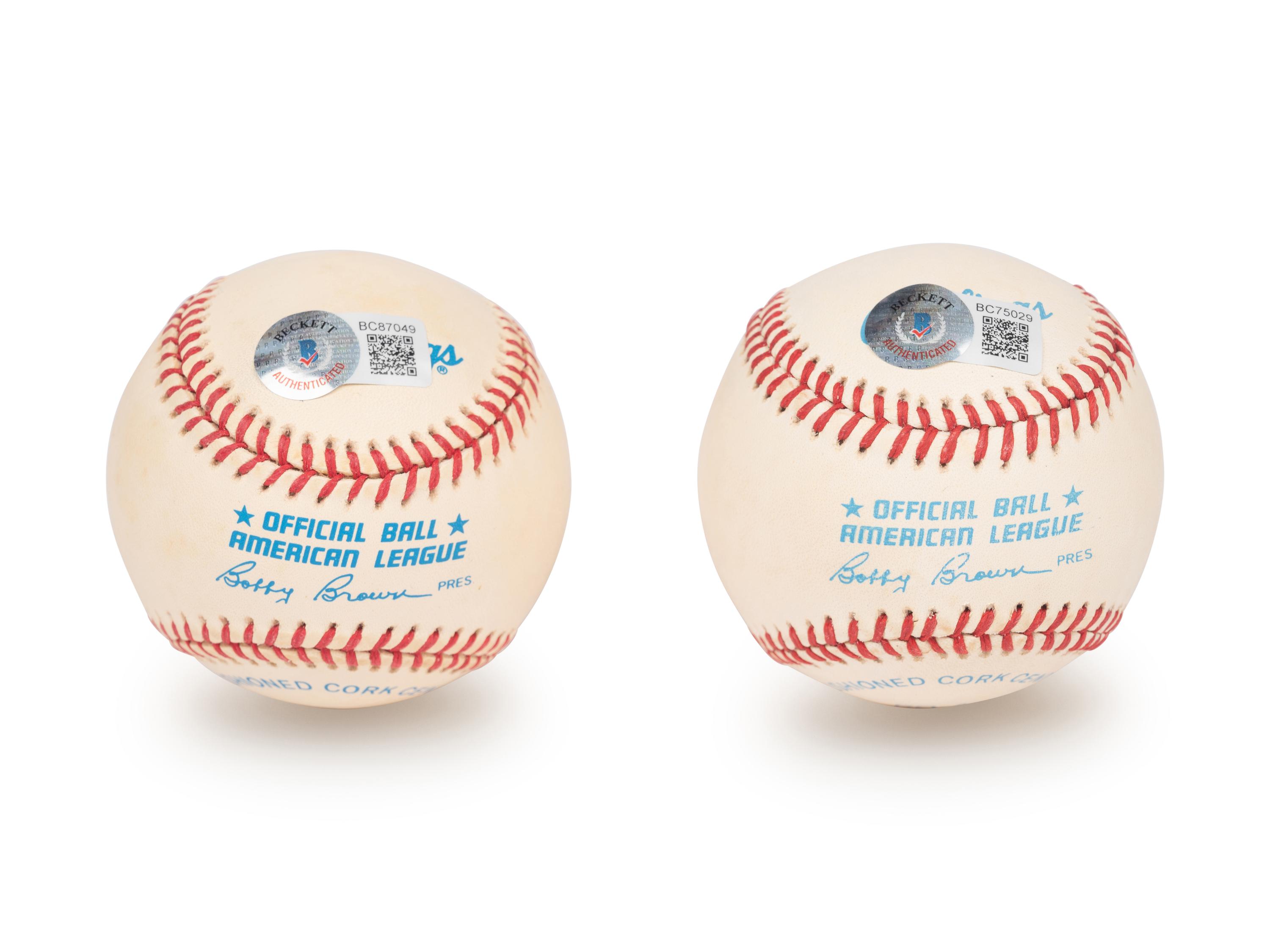 A Group of Yogi Berra and Whitey Ford Signed Autograph Baseballs (Beckett Authentication Services BAS Certified),
