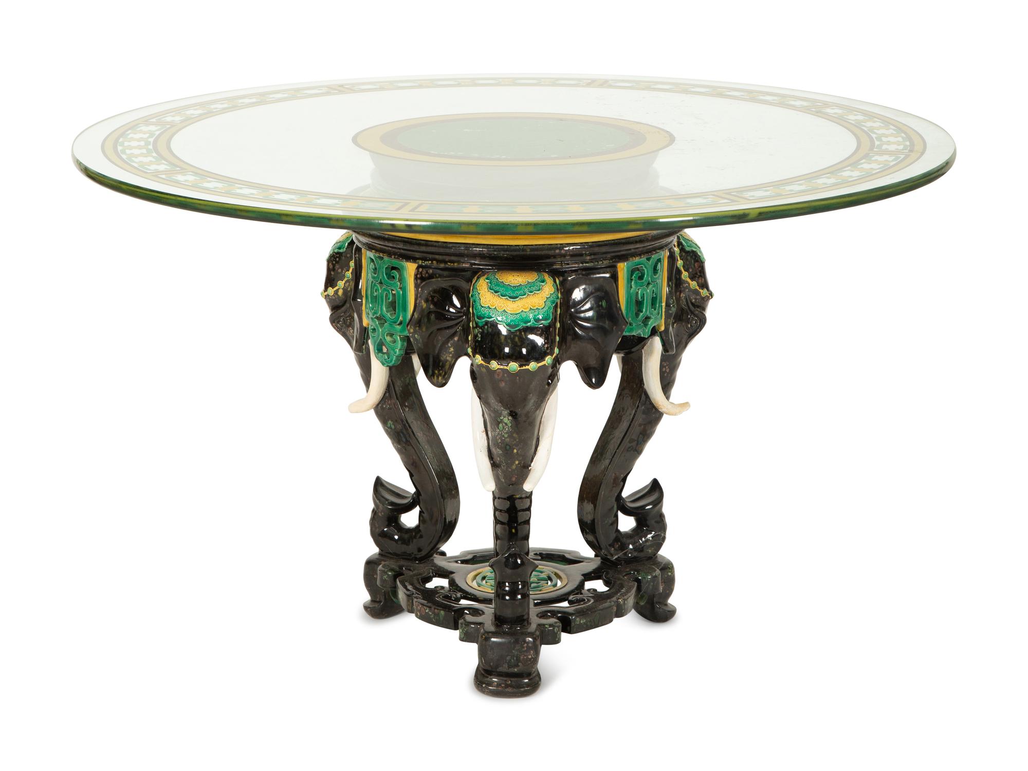 A Glazed Ceramic Elephant Base Table with Painted Glass Top — 20th Century