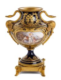 A Sevres Style Gilt Bronze Mounted Porcelain Urn Height 12 3/8 inches. — 19TH CENTURY