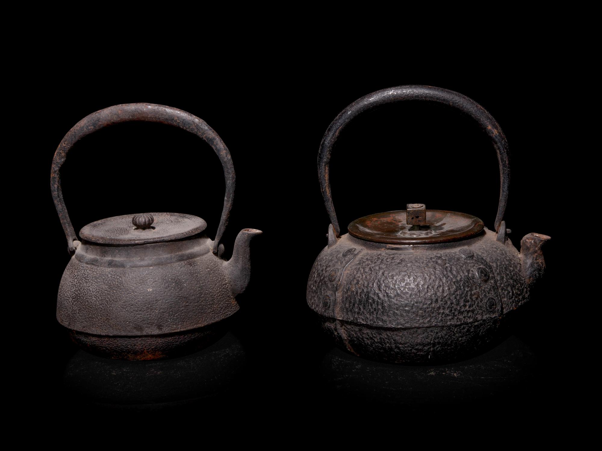 Seven Japanese Cast Iron Teapots, Tetsubin, and Burner