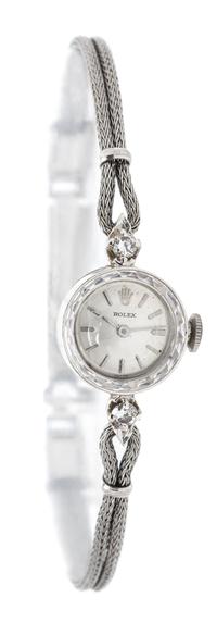 A Vintage 14 Karat White Gold, Gold Filled, Steel and Diamond Wristwatch, Rolex, 7.10 dwts.