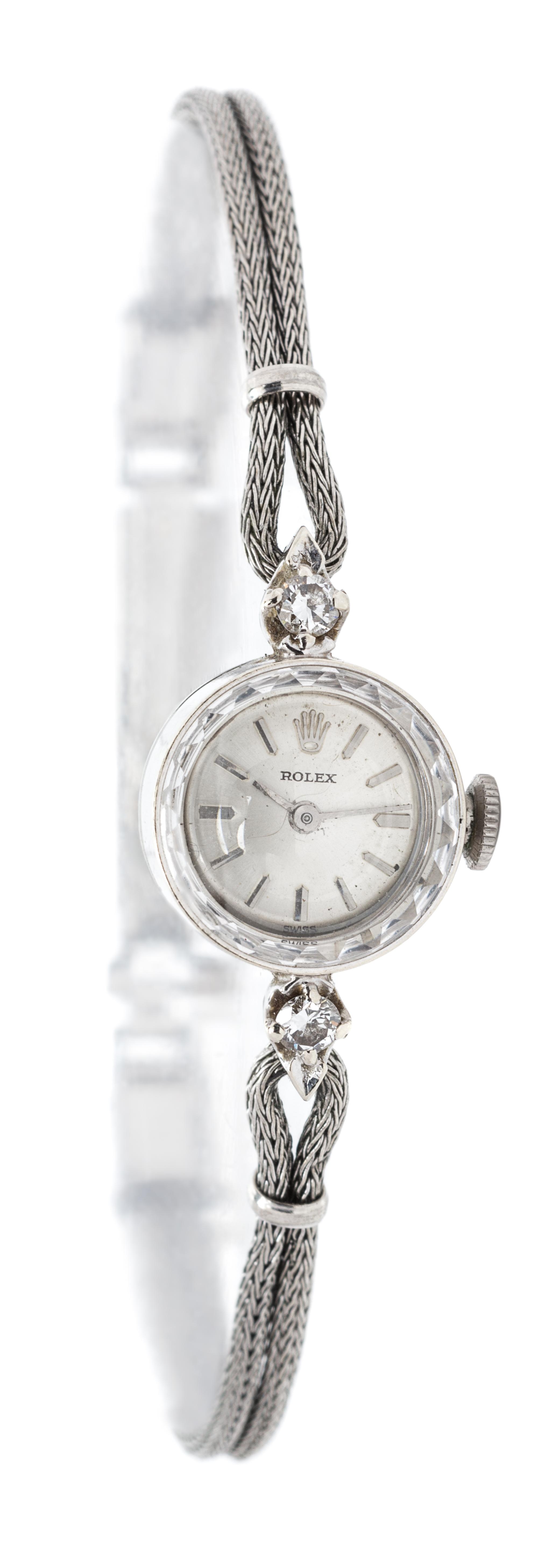 A Vintage 14 Karat White Gold, Gold Filled, Steel and Diamond Wristwatch, Rolex, 7.10 dwts.