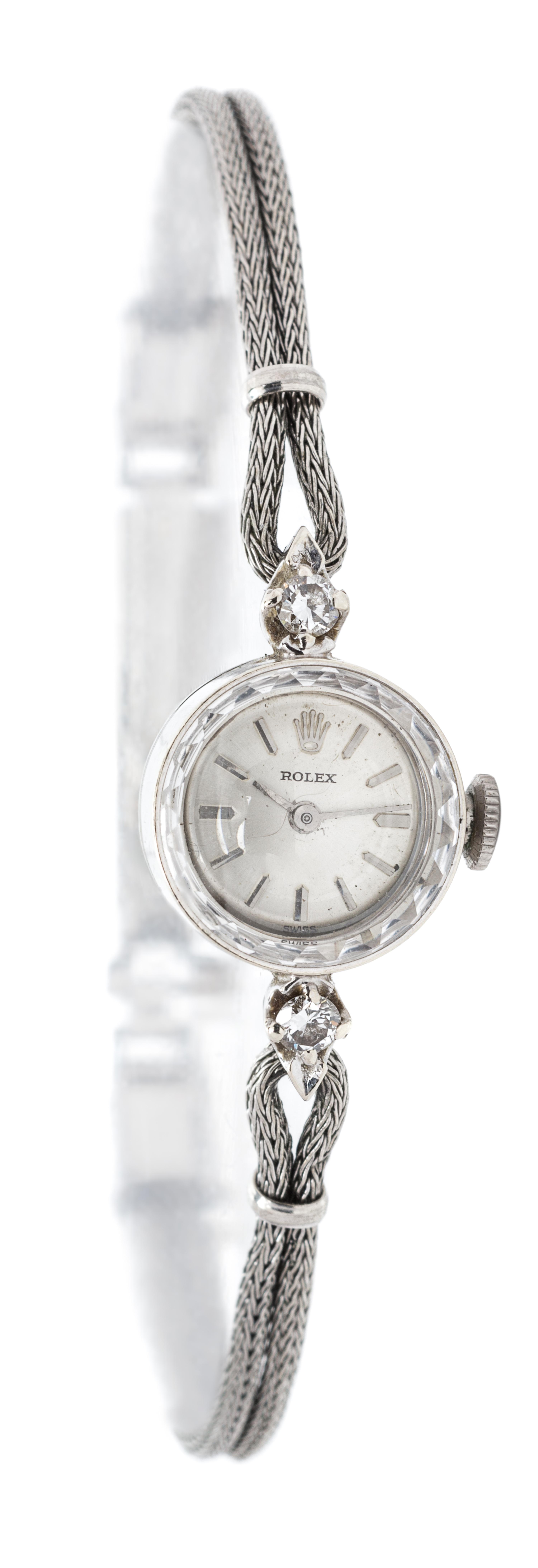 A Vintage 14 Karat White Gold, Gold Filled, Steel and Diamond Wristwatch, Rolex, 7.10 dwts.