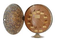 A Fred Zimbalist Twelve-Air Music Box Height 15 3/4; diameter of case 14 1/8 inches.