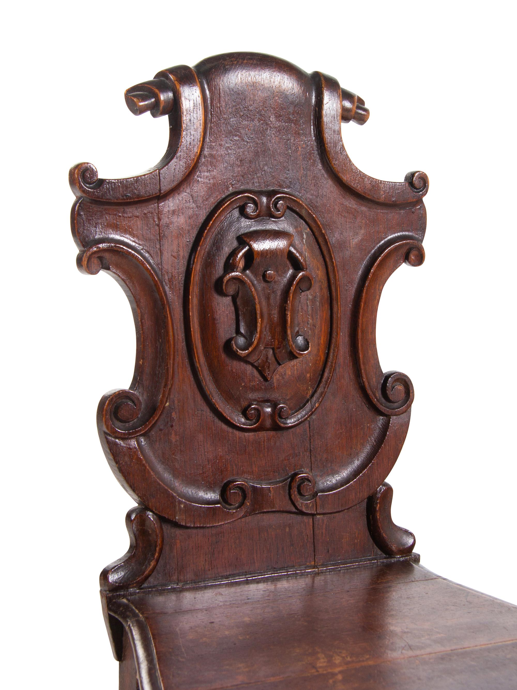 A Pair of Regency Style Oak Hall Chairs