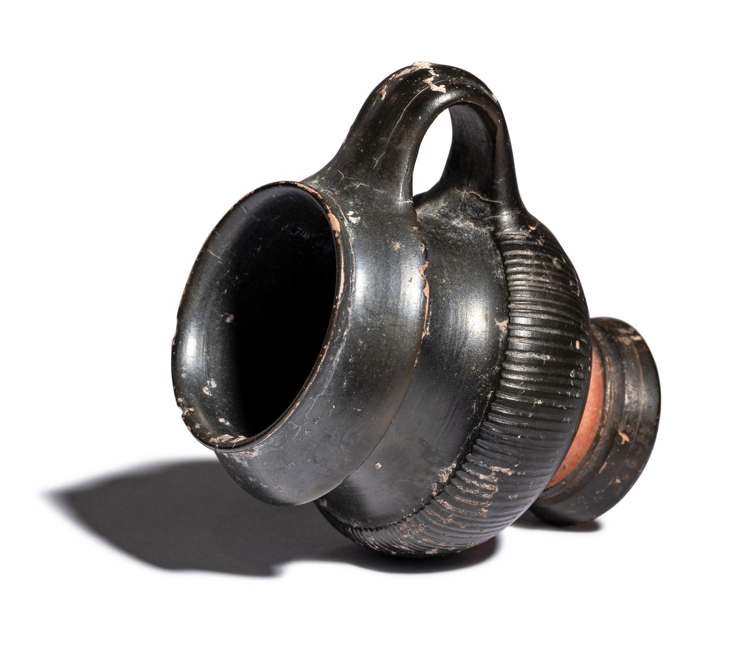 An Apulian Black-Glazed Oinochoe