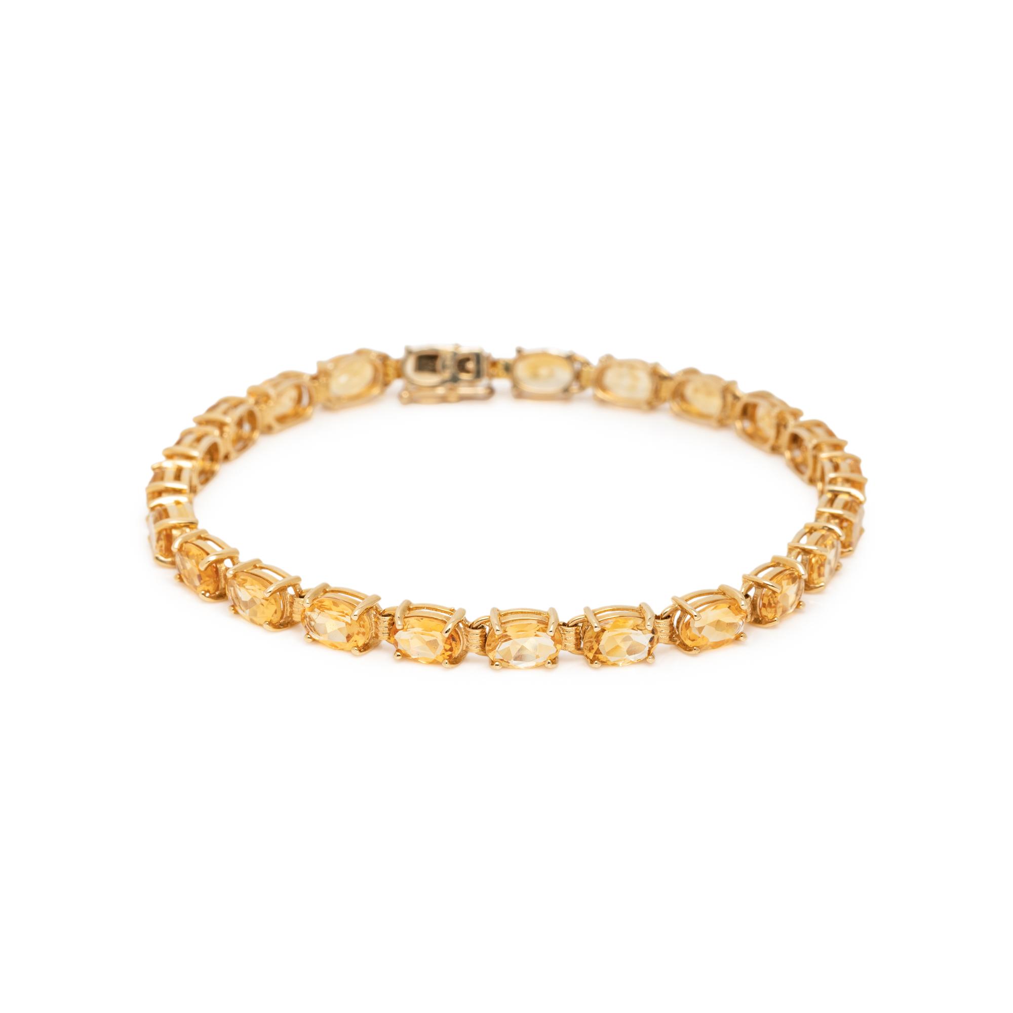 COLLECTION OF YELLOW GOLD AND CITRINE JEWELRY