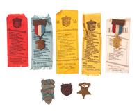 [CIVIL WAR]. GAR badges and ribbons, many 11th Ohio Volunteer Infantry, incl. IDed ladder badge.