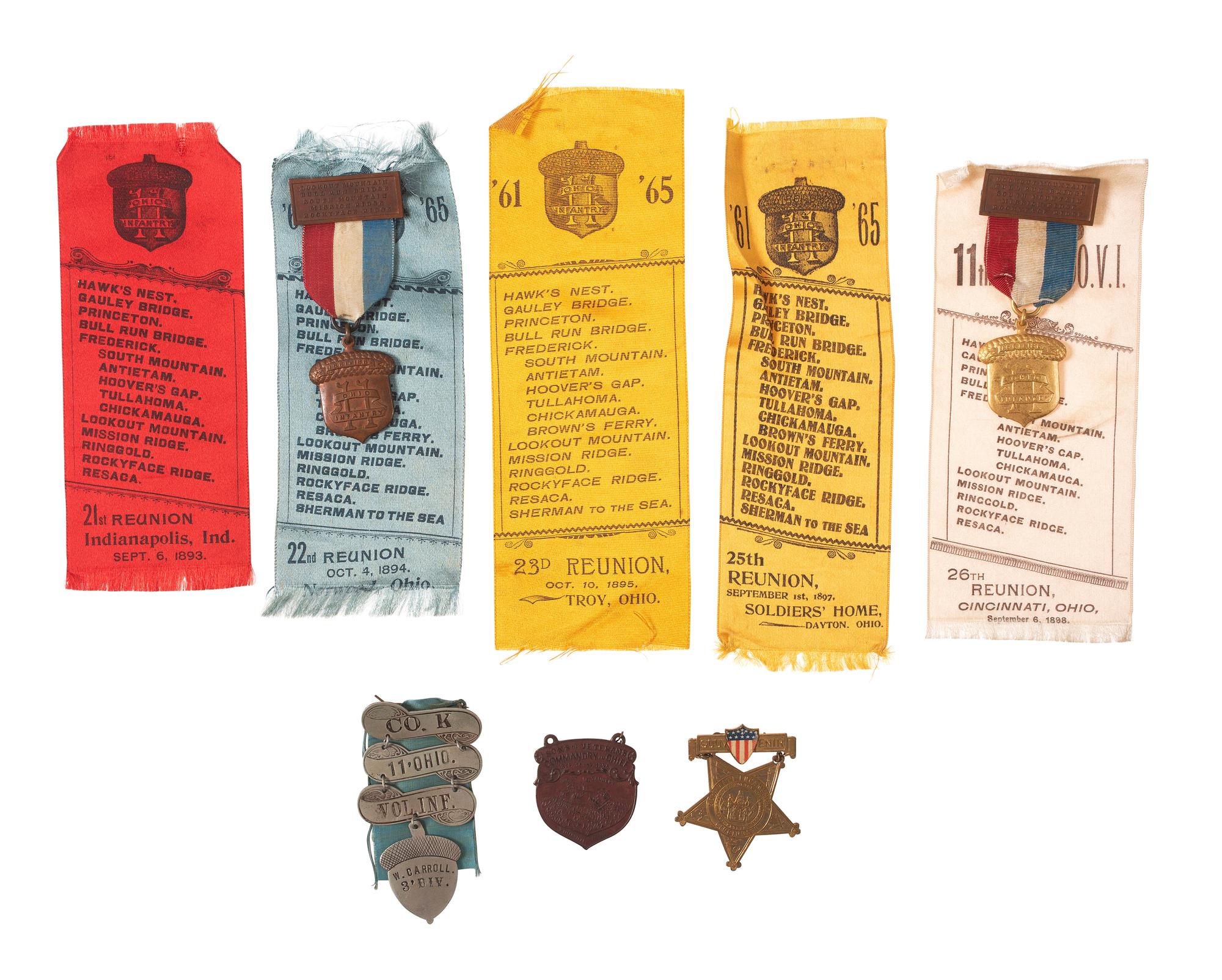 [CIVIL WAR]. GAR badges and ribbons, many 11th Ohio Volunteer Infantry, incl. IDed ladder badge.