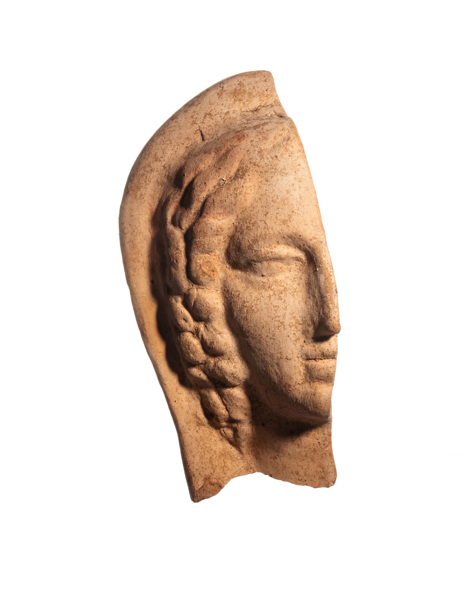 An Etruscan Terra Cotta Votive Half Head