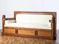 An Art Nouveau Mahogany and Brass Sofa, Attributed to Thorvald Bindesbøll (Danish, 1846-1908)