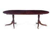 A Regency Style Mahogany Double Pedestal Extension Dining Table — 20TH CENTURY