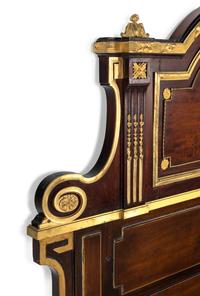 A Louis XVI Style Gilt Bronze Mounted Mahogany Headboard