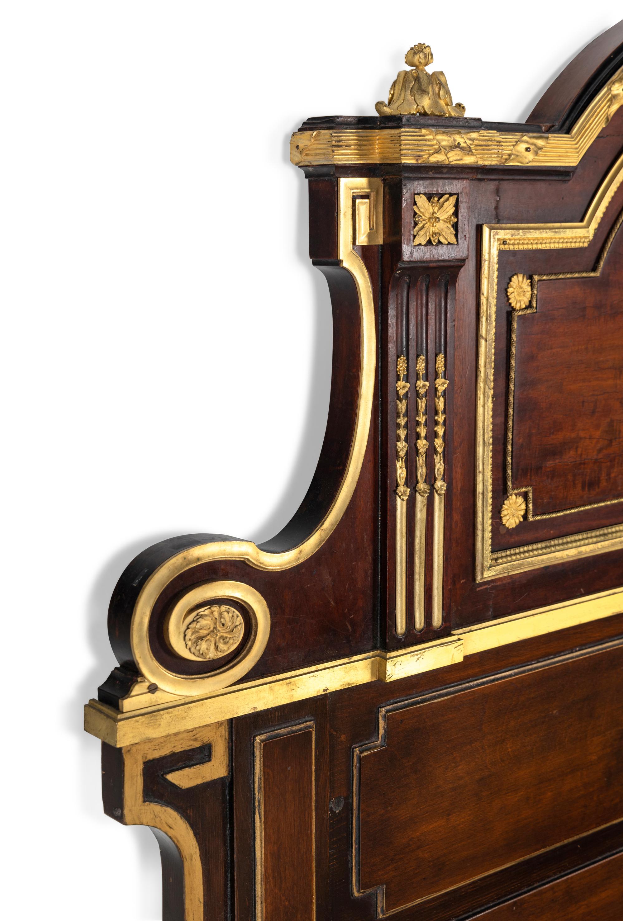 A Louis XVI Style Gilt Bronze Mounted Mahogany Headboard