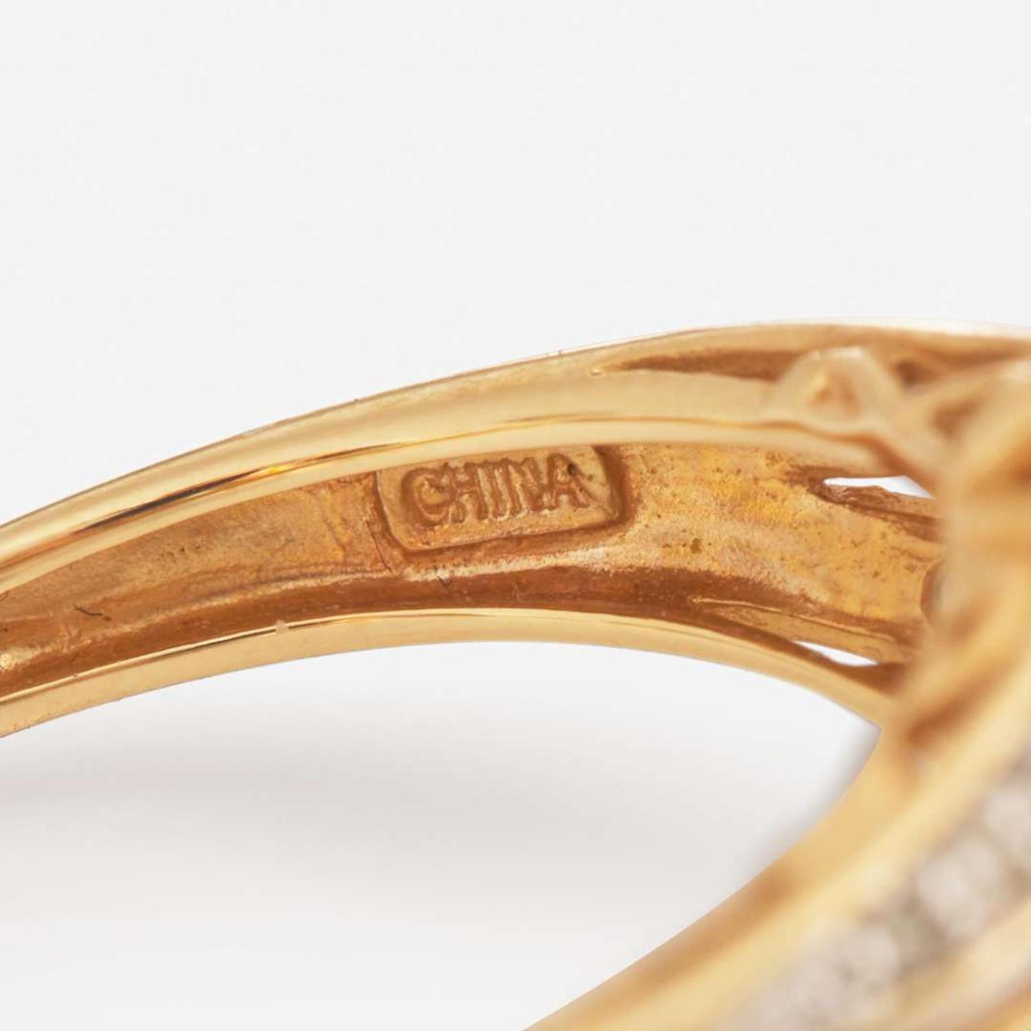 A Collection of Three Contemporary Gold and Gemstone Rings
