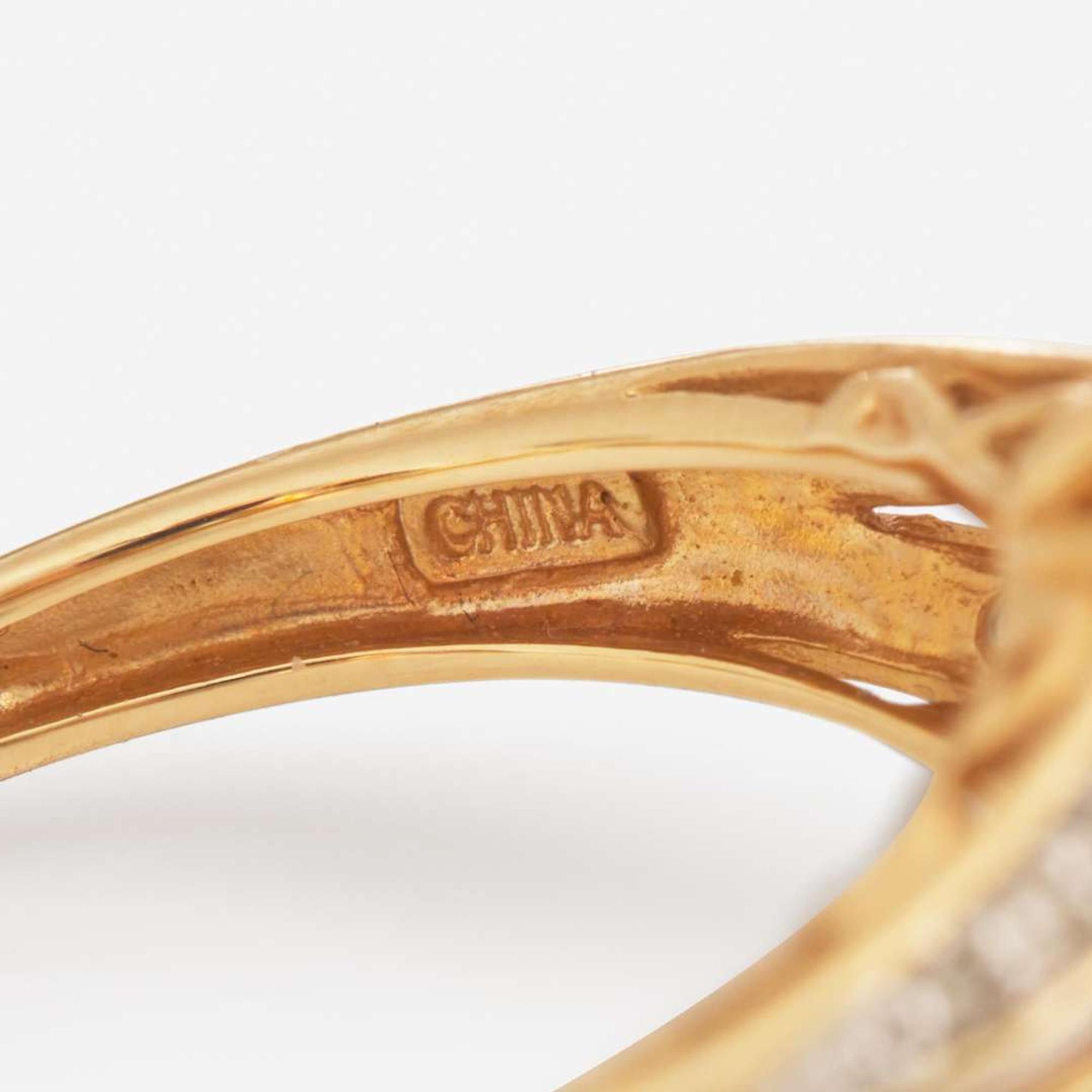 A Collection of Three Contemporary Gold and Gemstone Rings