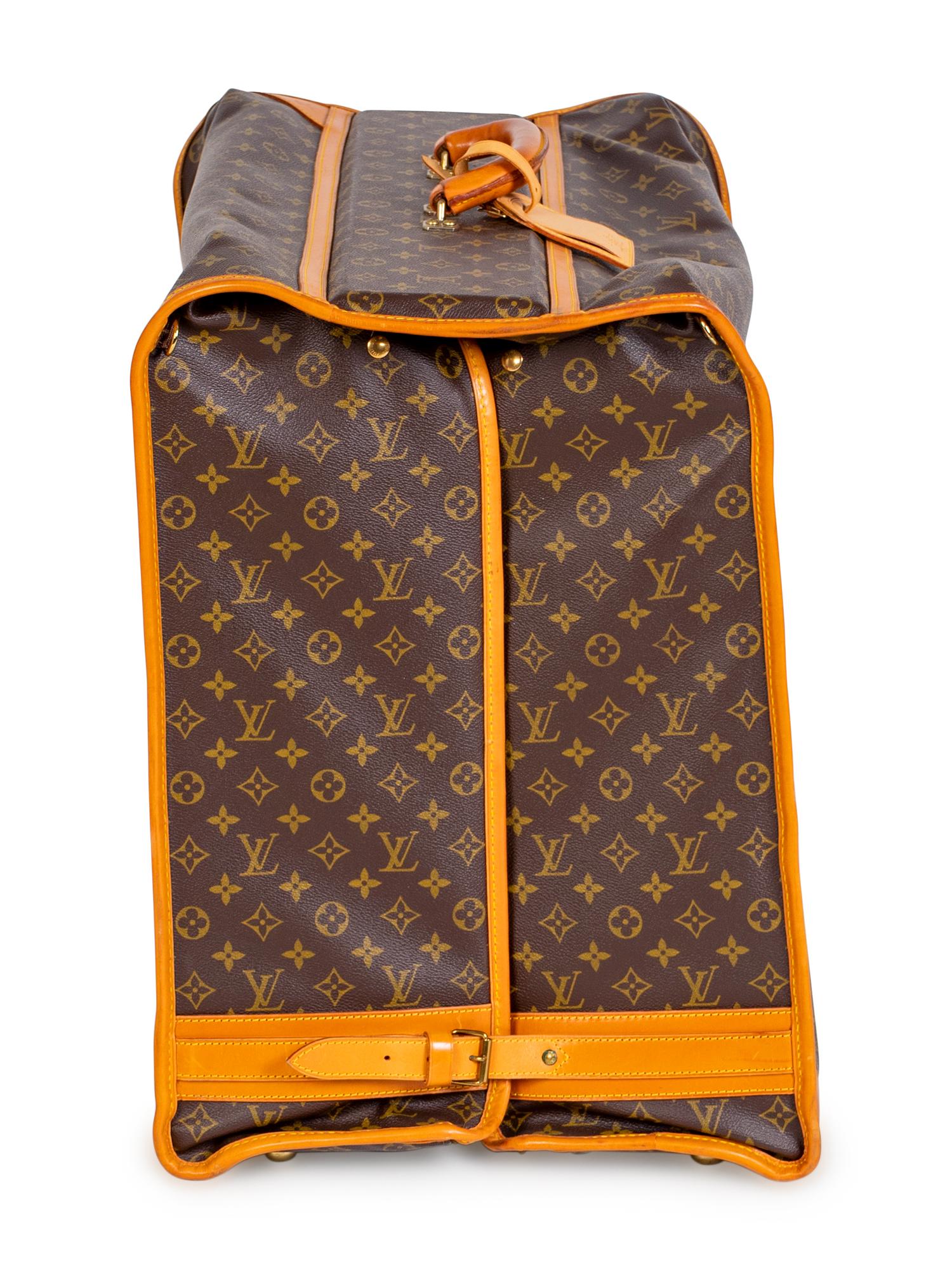 A Louis Vuitton Folding Soft Garment Bag — 20TH CENTURY