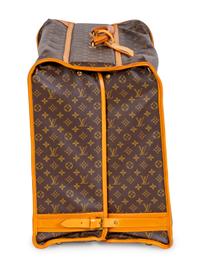 A Louis Vuitton Folding Soft Garment Bag — 20TH CENTURY