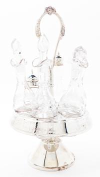 A Silver-plate Cruet Set Height of cruet stand overall 13 3/4 inches.