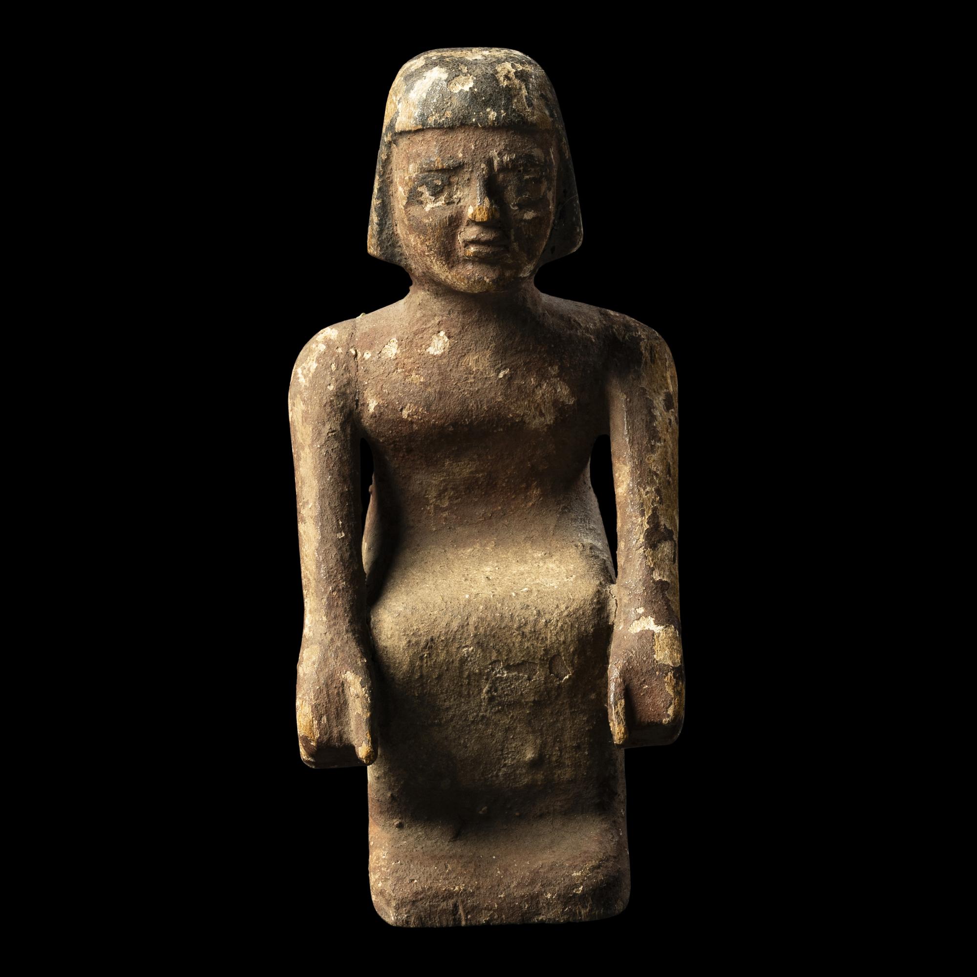 An Egyptian Painted Wood Boatman