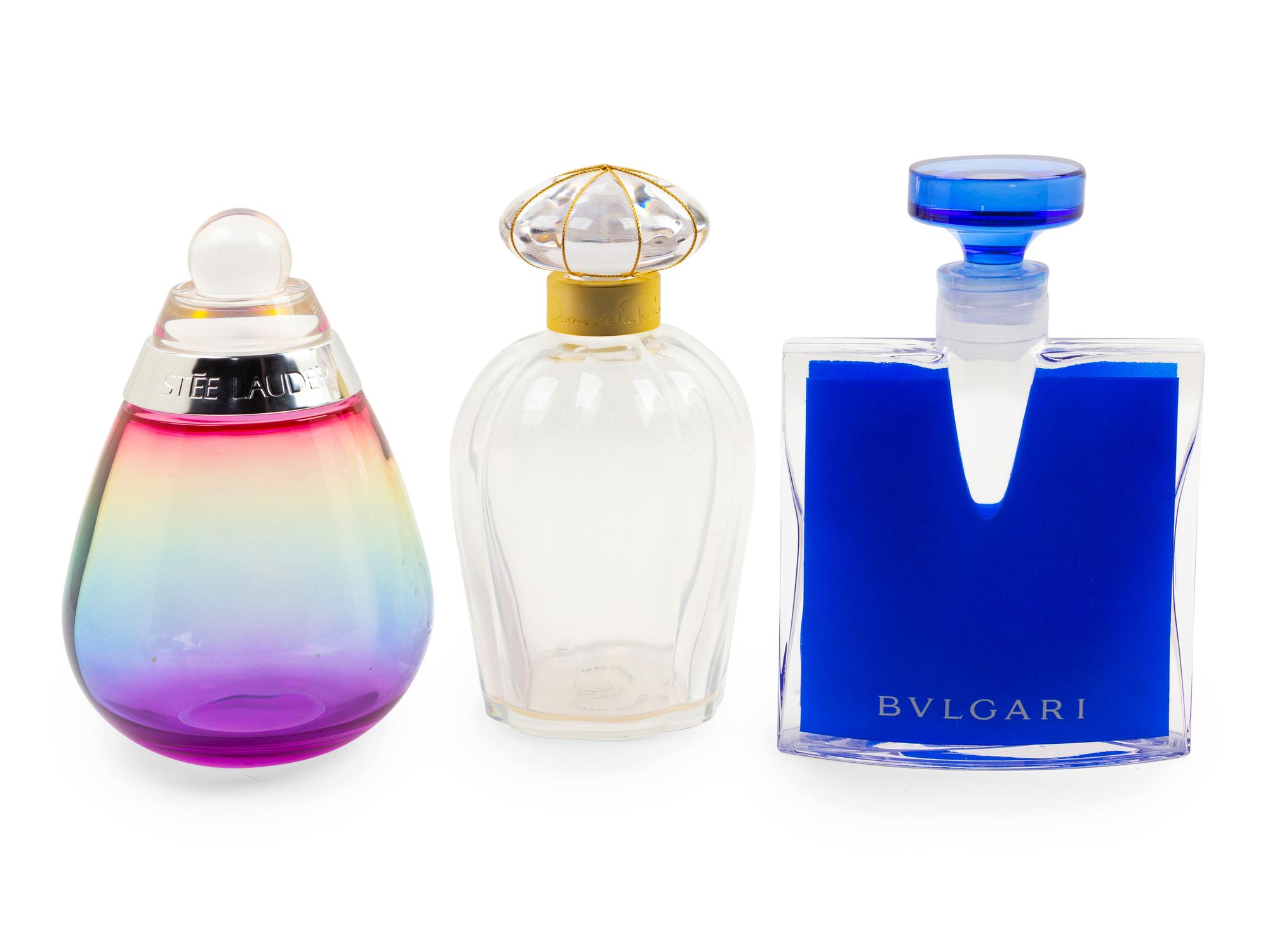 A Group of Three Factice Perfume Bottles