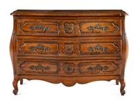 A Louis XV Style Walnut Bombe Commode