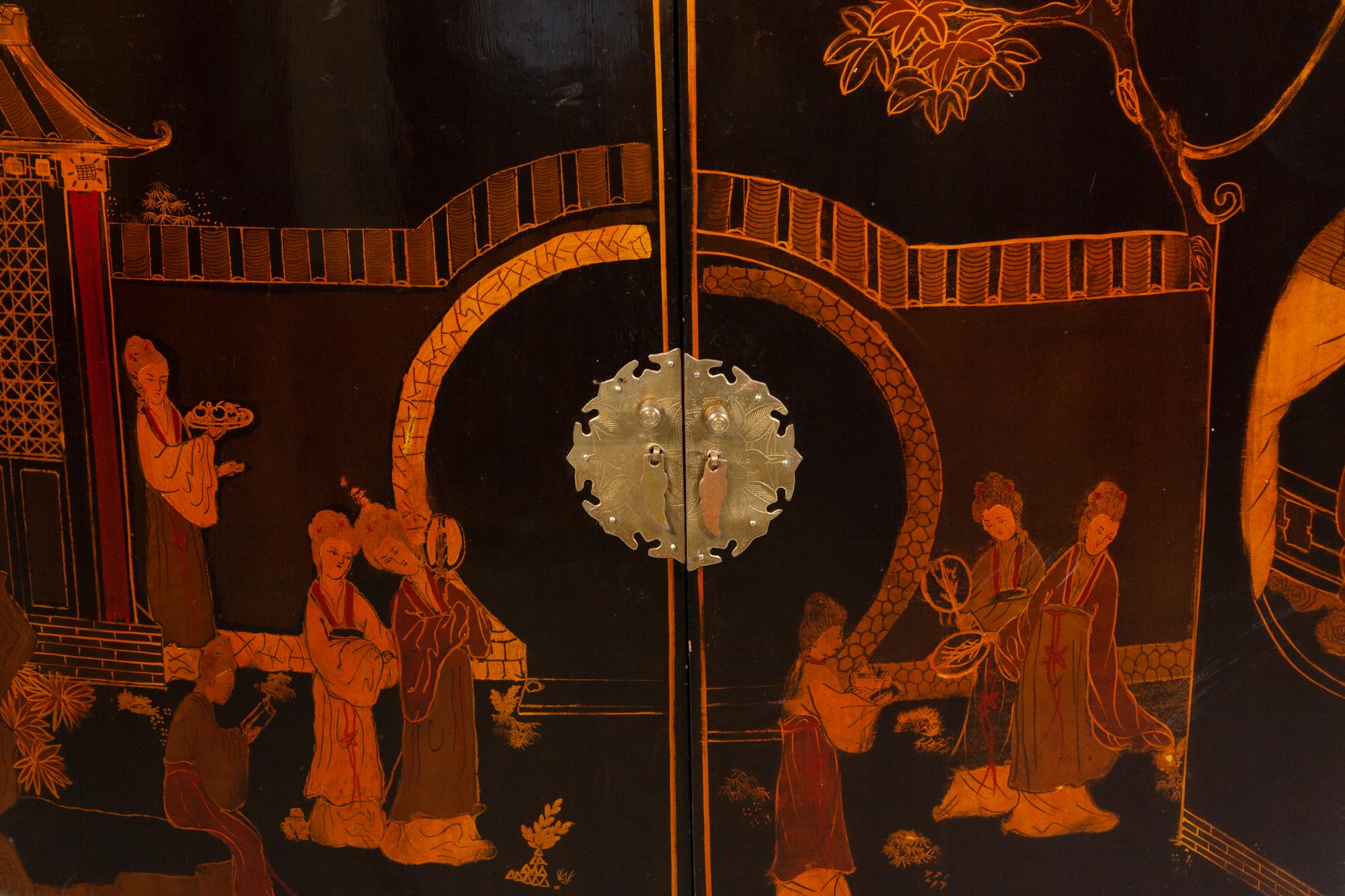 A Regency Style Black Japanned Bow-Front Cabinet
