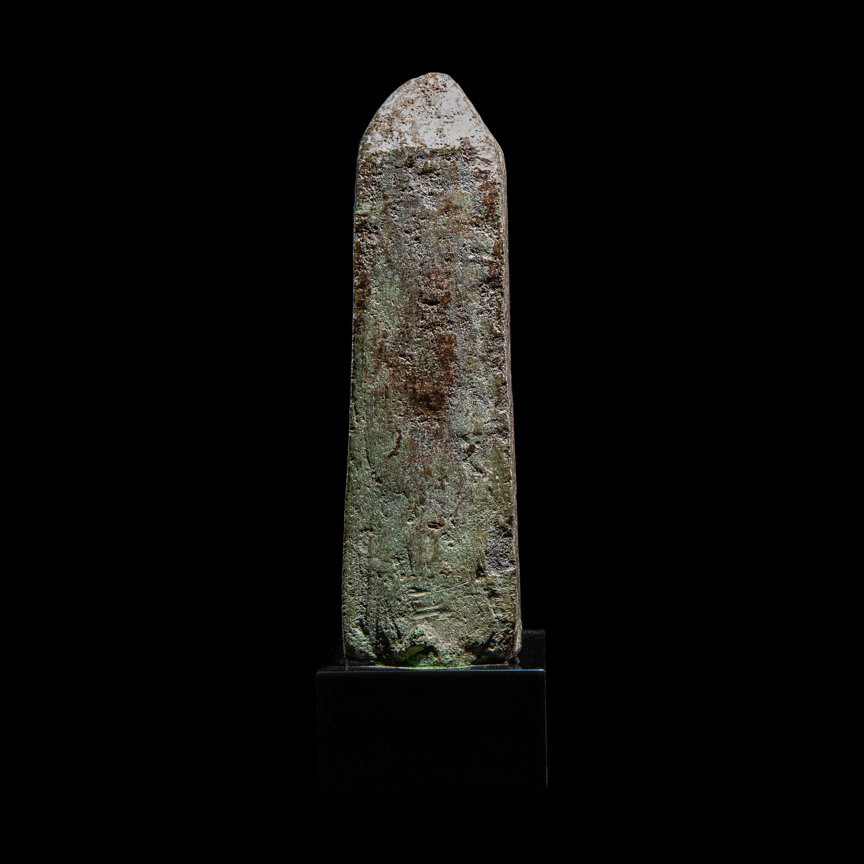An Egyptian Bronze Lion-Headed Goddess and Obelisk
