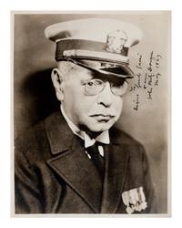 SOUSA, John Philip (1854-1932). Black and white photographic portrait signed (“John Philip Sousa”) and additionally inscribed, May 1927.